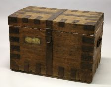 AN OAK AND IRON BAND SILVER CHEST, the front with applied brass owner's plaque for 