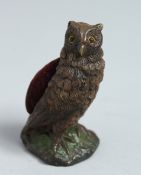 A COLD PAINTED OWL PIN CUSHION