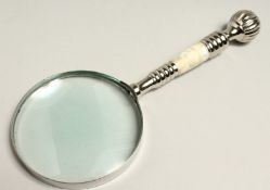 A MAGNIFYING GLASS WITH CHROME AND MOTHER OF PEARL HANDLE.