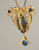 A GILT SCARAB PENDANT