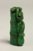 A CARVED PIECE OF JADE.