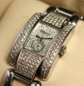 A VERY GOOD CHOPPARD DIAMOND SET WRIST WATCH AND BRACELET. No. 41/ 8380 1093723 8357. Box with