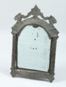 AN 18TH CENTURY PEWTER CLAD STRUT MIRROR 15ins x 10ins.