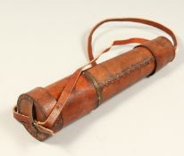 A LEATHER TELESCOPE on a stand.