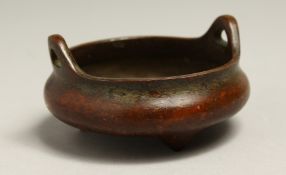 A SMALL CHINESE BRONZE TWO HANDLED CENSER 3ins diameter