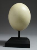 AN OSTRICH EGG on a stand 5.5ins