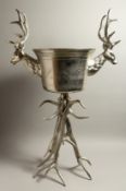 A LARGE STAG WITH COOLER on a stand. 38ins high.