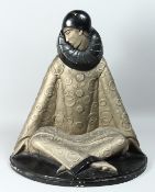 A LARGE HEAVY TERRACOTTA SEATED FIGURE in the Art Deco style on a marble base. 27ins high.