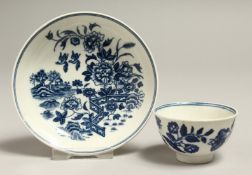 A MINIATURE WORCESTER BLUE AND WHITE TEA BOW AND SAUCER, fence pattern, circa. 1775, Mona Sattin