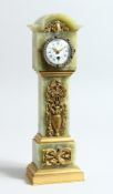 A FRENCH ONYX AND GILT BRONZE MINIATURE LONGCASE CLOCK, CIRCA. 1900 in a leather case.
