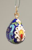 A RUSSIAN SILVER AND ENAMEL EGG PENDANT