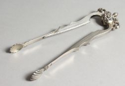 A PAIR OF AUSTRIAN SILVER SUGAR TONGS.