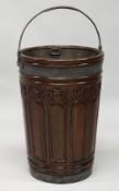 A VERY GOOD LARGE CARVED MAHOGANY 19TH CENTURY STYLE PEAT BUCKET, with metal liner. 26ins high.