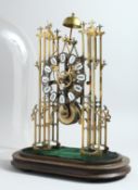 A VICTORIAN BRASS SKELETON CLOCK, CIRCA. 1900, with openwork dial, Roman numerals on a wooden