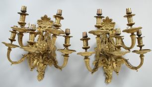 A GOOD PAIR OF ORMOLU FIVE LIGHT WALL light APPLIQUES with two ties of scrolling light branches