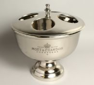 A MOET & CHANDON CHAMPAGNE CIRCULAR FOUR BOTTLE COOLER.