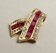 A 14CT GOLD AND RUBY PENDANT