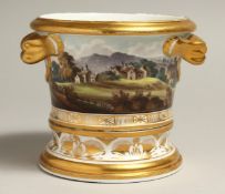 AN EARLY 19TH CENTURY HERCULANEUM CACHE POT AND STNAD painted with a fine continuous landscape