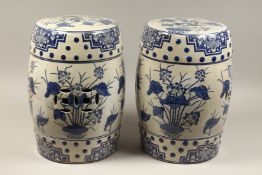 A PAIR OF BLUE AND WHITE PORCELAIN BARREL SEATS 17ins high.