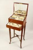 A GOOD MAHOGANY CASED VANITY BOX ON STAND with silver fittings. London 1915. 2ft 9ins high, 1ft