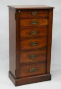 A GOOD 19TH CENTURY MAHGOANY MILITARY WELLINGTON CHEST OF SIX GRADUATED DRAWERS with inset brass