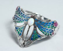 A SILVER OPAL RUBY AND PLIQUE ENAMEL DRAGONFLY BANGLE.