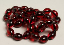 A STRING OF SIMULATION AMBER BEADS