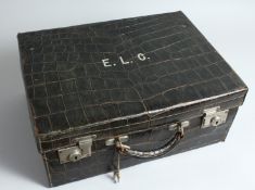 A DREW & CO., LONDON, CROCODILE SUITCASE, initials E. L. C. 17ins long x 12 ins deep x 7ins high.