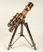 A LEATHER TELESCOPE on a stand.