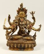 AN EASTERN BRONZE MULTI-ARMED DEITY in seated position with coral and turquoise inlays.