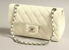 A LADIES WHITE QUILTED LEATHER SHOULDER BAG