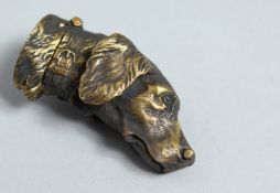 A NOVELTY BRONZE DOG'S HEAD VESTA