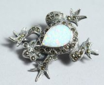 A SILVER FROG BROOCH