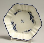 AN 18TH CENTRUY CAUGHLEY RARE PUNCH POT STAND painted in the Chantilly spigs pattern.