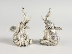 A PAIR OF .800 ELEPHANT SALT AND PEPPERS.