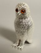 A SILVER PLATED OWL SUGAR SIFTER