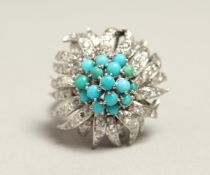 A VERY GOOD 18CT WHITE GOLD RUBY, DIAMOND AND TURQUOISE CLUSTER RING.