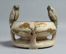 AN UNUSUAL CONTINENTAL ART NOUVEAU POTTERY BOWL, gilt decorated with oak leaves and mounted with a