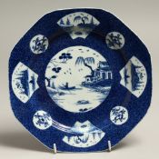 A GOOD BOW BLUE AND WHITE OCTAGONAL PLATE, circa. 1760 - 1765, with Chinese designs. 9ins