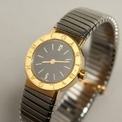 A GOOD BULGARI WRIST WATCH AND BRACELET, two colours. No. BB 23 27 P. 73245 Boxed.