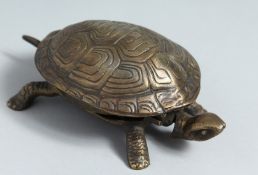 A NOVELTY BRONZE TORTOISE TABLE BELL.