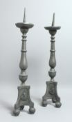 A PAIR OF 18TH / 19TH CENTURY DUTCH PEWTER PRICKET CANDLESTICKS. 22ins high.