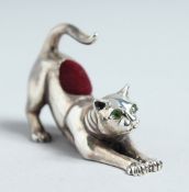 A CAST SILVER CAT PIN CUSHION.