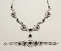 A SUPERB 18CT WHITE GOLD, DIAMOND AND SAPPHIRE NECKLACE AND BRACELET, set with fifteen sapphires
