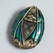 A BRASS ENAMEL BAT VESTA
