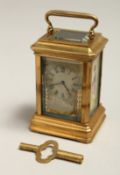 A MINIATURE SEVRES DESIGN CARRIAGE CLOCK 3ins.