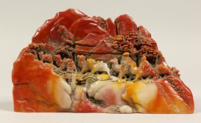 A CHINESE CARVED HARDSTONE BOULDER with a camel train. 9ins long.