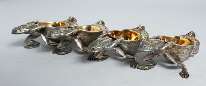 A SET OF FOUR CAST FROG SALTS