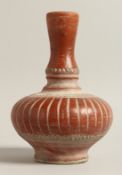 A TURKISH TERRACOTTA POT 9.5ins high.