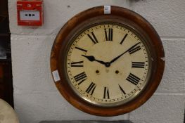 A circular wall clock.